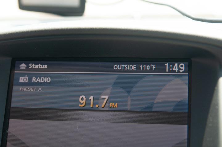 Photo of car radio showing heat of 110F